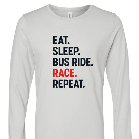 white long-sleeve shirt with text 'EAT. SLEEP. BUS RIDE. RACE. REPEAT.' on a white background.