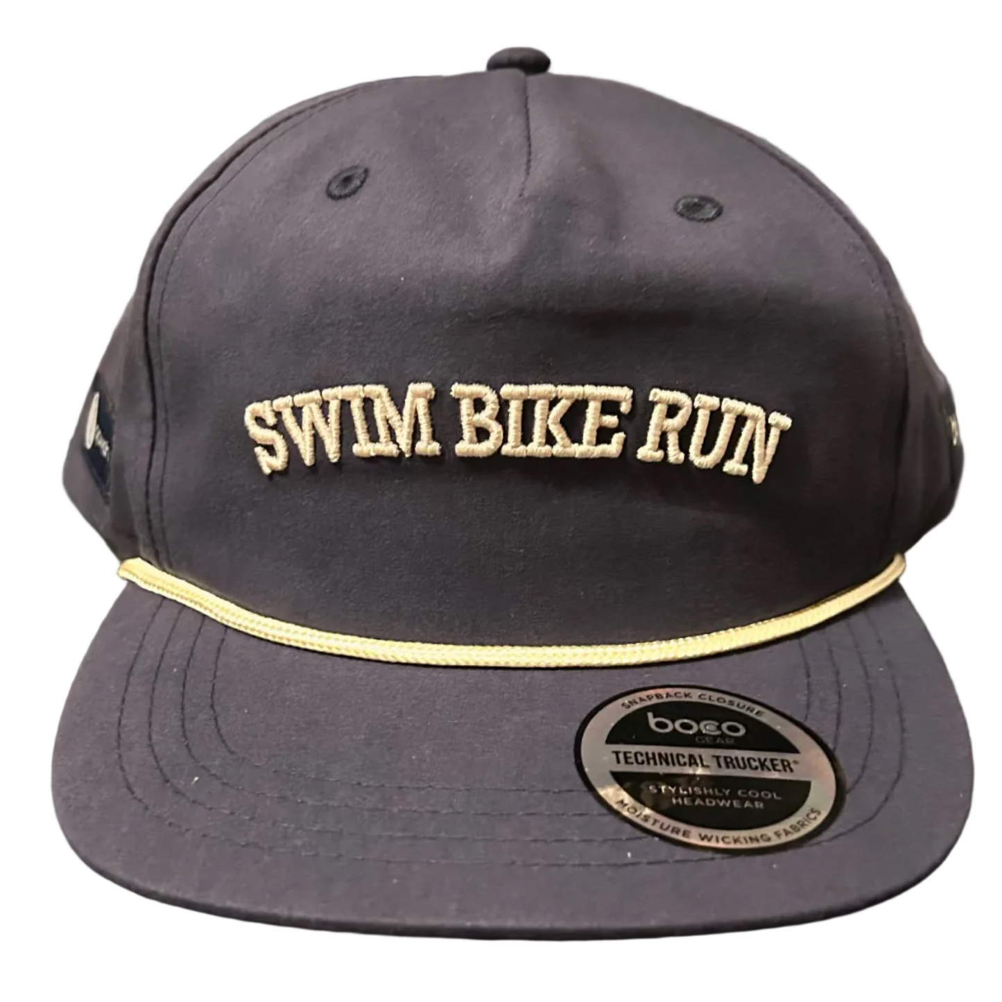 Navy blue cap with 'SWIM BIKE RUN' text on a dark surface