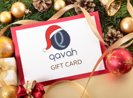 Gift card with qavah logo surrounded by Christmas decorations